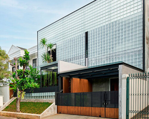 glass block external skin enfolds refraction house by RAD+ar in indonesia