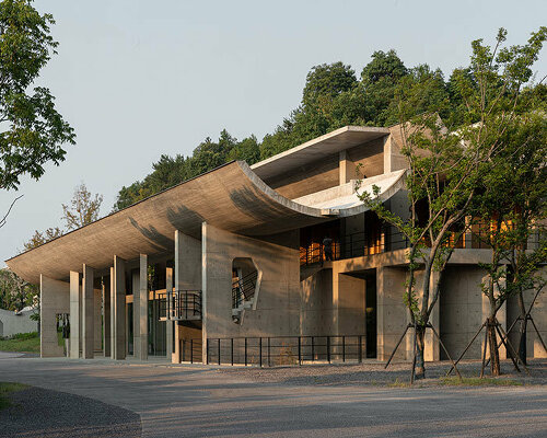 imposing inverted arches top studio zhu pei's international conference camp in china