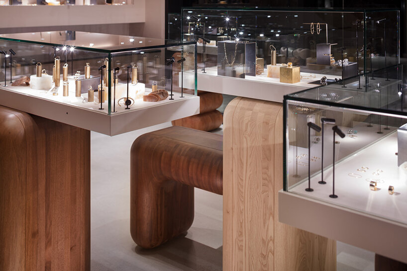 torafu architects pairs glass and wooden masses in hirotaka store