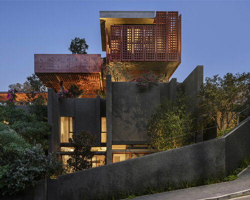 red concrete screens envelop SAOTA's upper albert family home in cape town