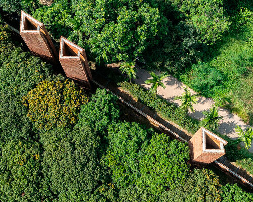 thousands of thin clay tiles cover museum's entire facade in vietnam