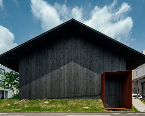 dark baked cedar planks shield gabled yamaguchicho house in japan