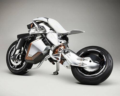 futuristic yamaha MOTOROiD2 balances and parks itself by pulling the kickstands on its own