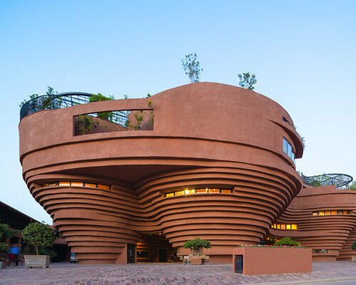 1+1>2 architects' pottery museum rises like a canyon amid the bat trang village in vietnam