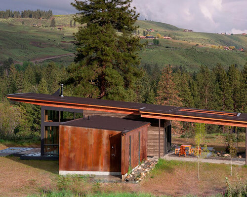 pbw architects sets modern industrial cabin along chewuch river in washington