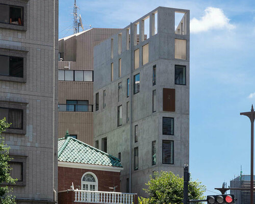 florian busch architects' minimalistic nobori building rises as a narrow slice in tokyo