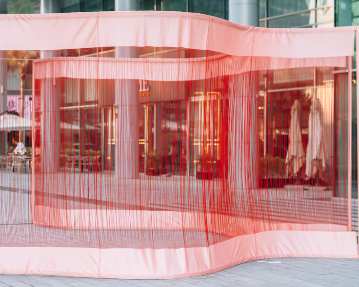 palestinian artist areen's flowing installation unravels waves of threads at dubai design week