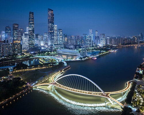 a vibrant social space, haixin bridge curves across the pearl river to reconnect guangzhou