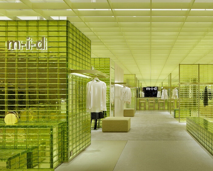 yellow glass bricks and louvers shape curiosity's labyrinthine concept store in osaka