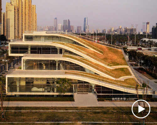 undulated hill-like planted steps merge contemporary art center in china with urban fabric