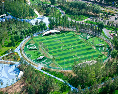 undulating colored pathways run along PLAT ASIA's sports park in china