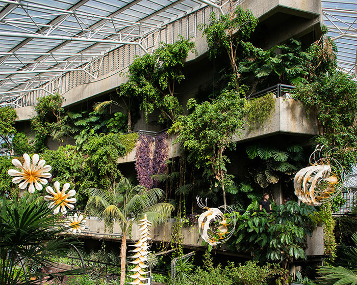 intricate organic sculptures by ranjani shettar weave into the barbican's lush conservatory