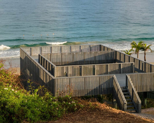 UAVI pavilion by PPAA is an ephemeral wooden haven rising above mexico's sandy shores