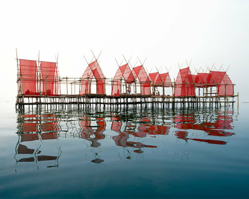 chat architects' oyster-tasting pavilion draws on traditional bamboo scaffolding in thailand