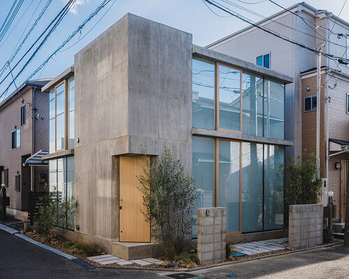 IGArchitects explores interconnectedness and privacy within concrete house in japan