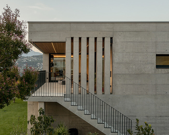 enrico sassi architetto sites 'villa lugano pregassona' over alpine lake in switzerland