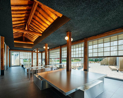 traditional wooden hanok roof frame tops nomal's renovated restaurant in korea