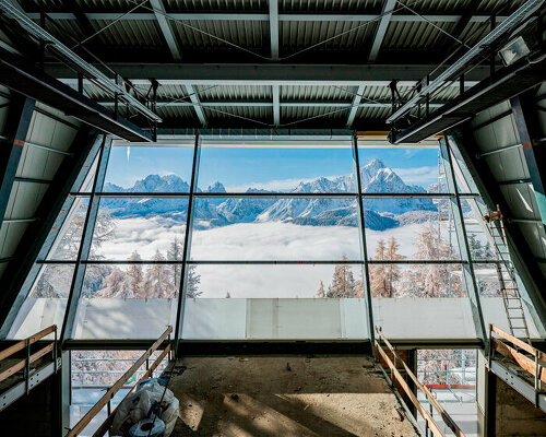 museum's glazed facade offers panoramic views of mountain elmo in italy