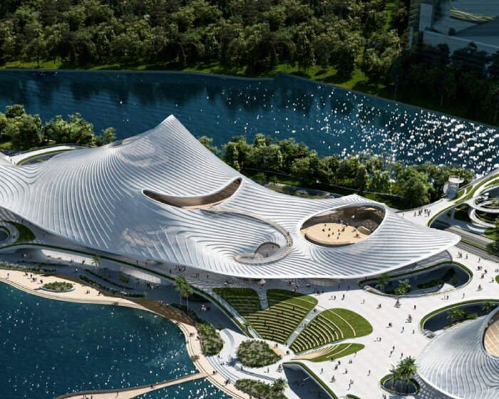 MAD architects' nanhai art center in china emerges from the lake like endless ripple of water