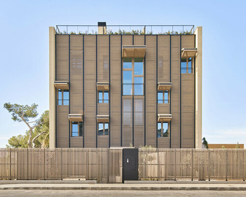 dynamic OHLAB facade switches from shutters to pergolas across paral·lel complex in spain