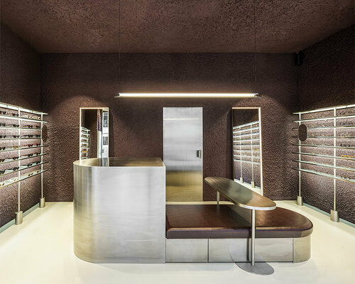 el departamento infuses mountainous hues into texturized optical boutique in madrid