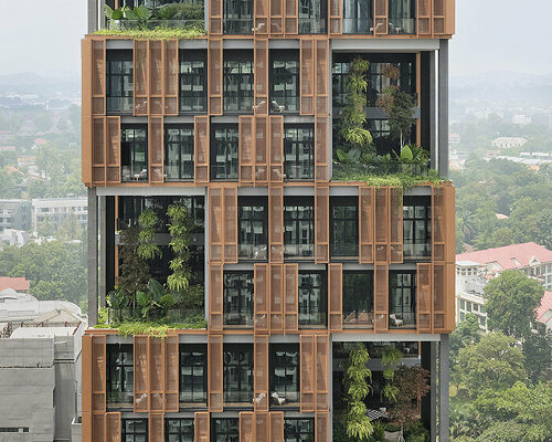 terracotta facade of hanging gardens fronts artyzen singapore hotel by ONG&ONG