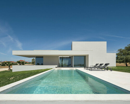 portuguese studio dp arquitectos curates 'casa em romeira' with sunny minimalism