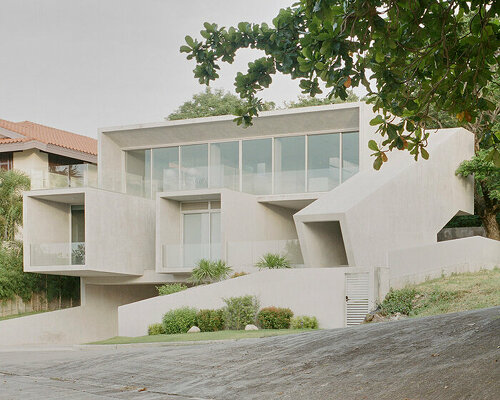 concrete cubes overlooking the ocean and sky compose CAZA's house in the philippines