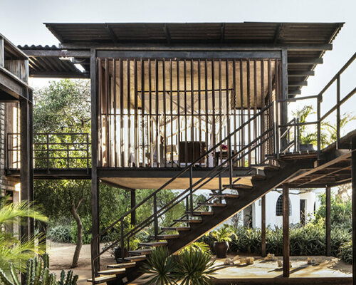 PAT.'s stilted falcon house is an ode to tropical modernism on kenya's manda island