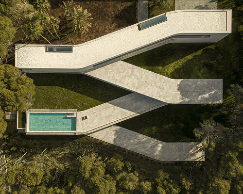 fran silvestre shapes this casa sabater by its sloping coastal site in spain