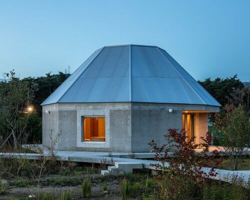 curious concrete dwellings by aoa architects seemingly hover above korean countryside