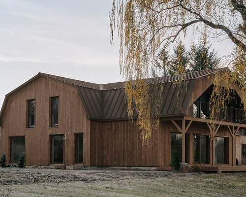 aging wood planks embrace the exterior of maison melba in quebec