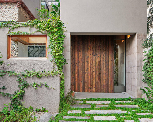 05 AM arquitectura fits a renovated townhouse in the historic streets of girona