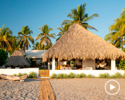 straw roof crowns coral house by elástica studio on el salvador's seaside