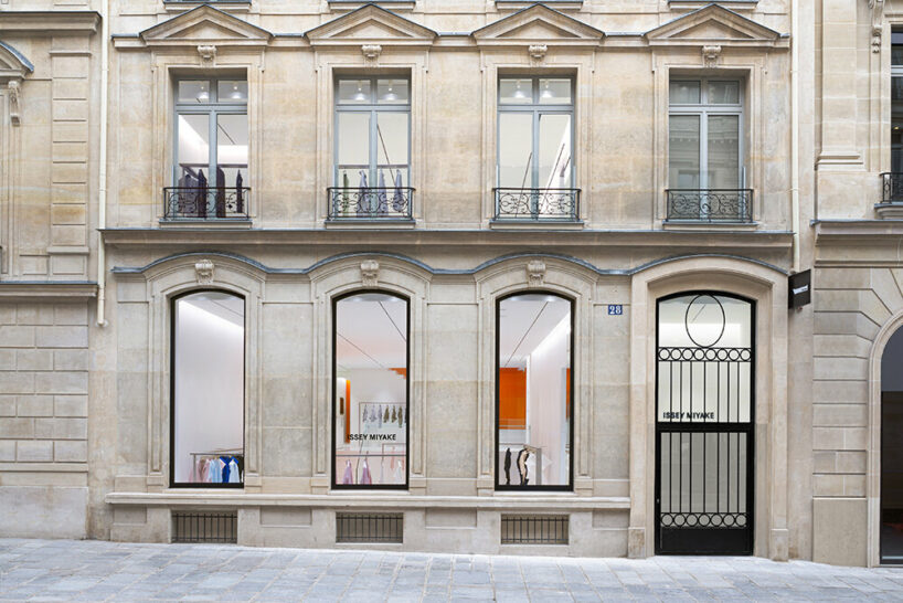 orange aluminum walls light up issey miyake's flagship in paris