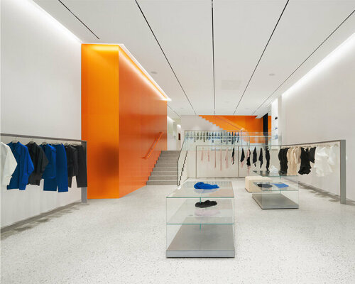 orange aluminum walls light up issey miyake's latest flagship store in paris