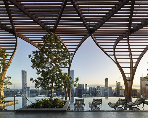 koichi takada architects shapes brisbane 'upper house' with twisting 'roots'