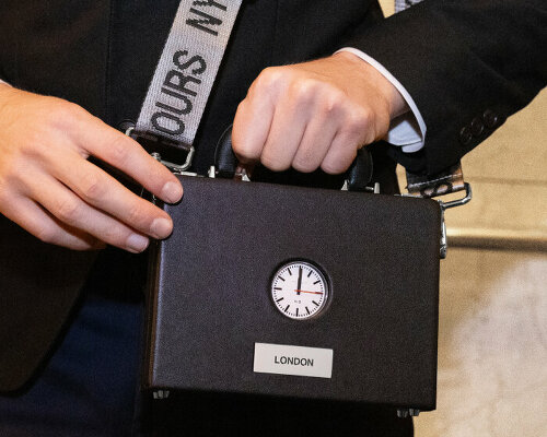 nik bentel puts anicorn’s watch on a mini sling briefcase so travelers always know the time