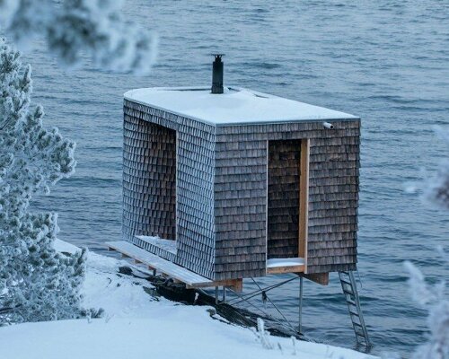 oslo works' wooden sauna perched above norwegian shore invites remote relaxation