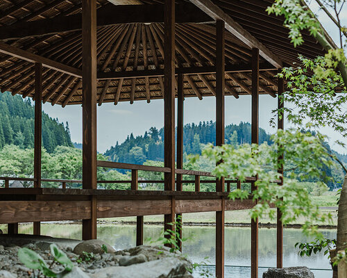 toru shimokawa utilizes ancient traditional wood for rustic café takenokuma in japan