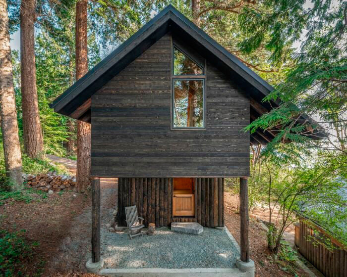 asymmetrical gable roof shields wooden bunkhouse by SHED on washington island