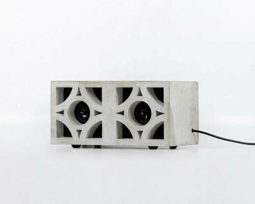 studio semblance fits a stereo inside of a concrete masonry block