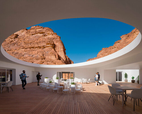 elliptical roof opening invites natural light within desert x AlUla visitor center 2022