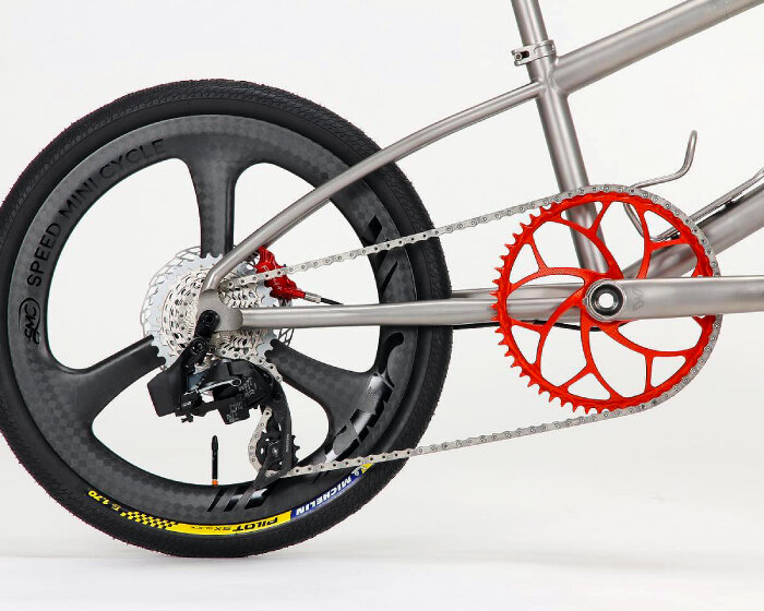 firefly’s titanium mini travel bike unfastens easily to fit in RIMOWA luggage