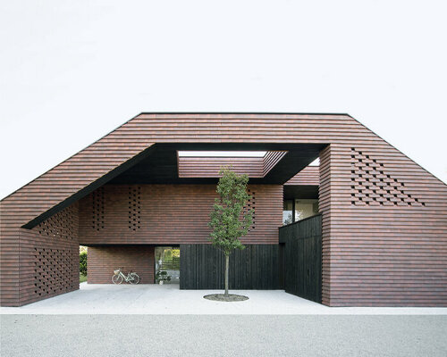 brick-tiled canopy doubles as playground for OFIS architects' frame house in slovenia