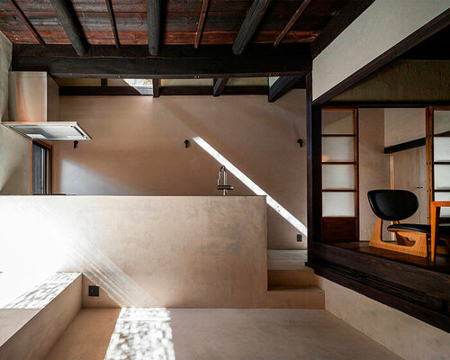 former textile workshop transforms into modern machiya residence in kyoto