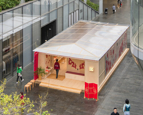 semi-transparent polycarbonate and wooden panels form nespresso pop-up café in shenzhen