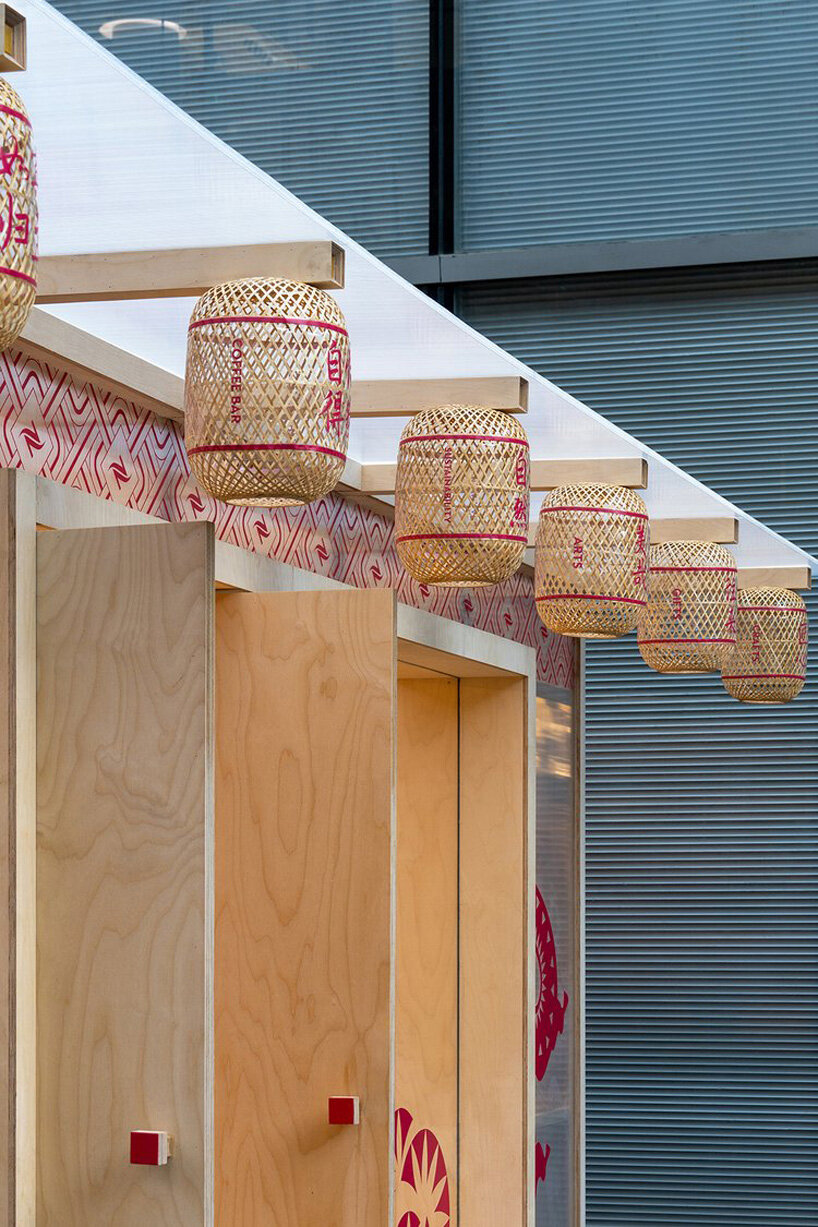 bamboo-woven lanterns ornament the exterior of the café