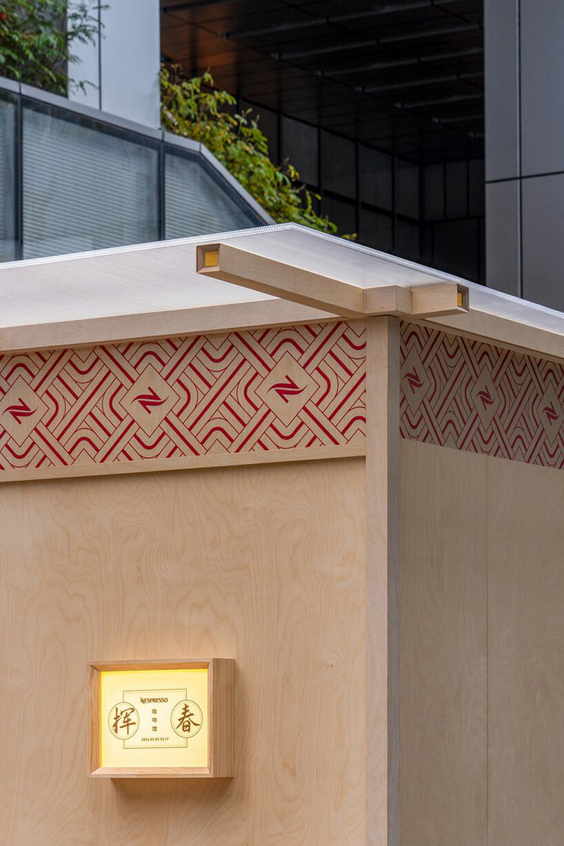 the tips of the roof rafters are decorated with a touch of gold paint