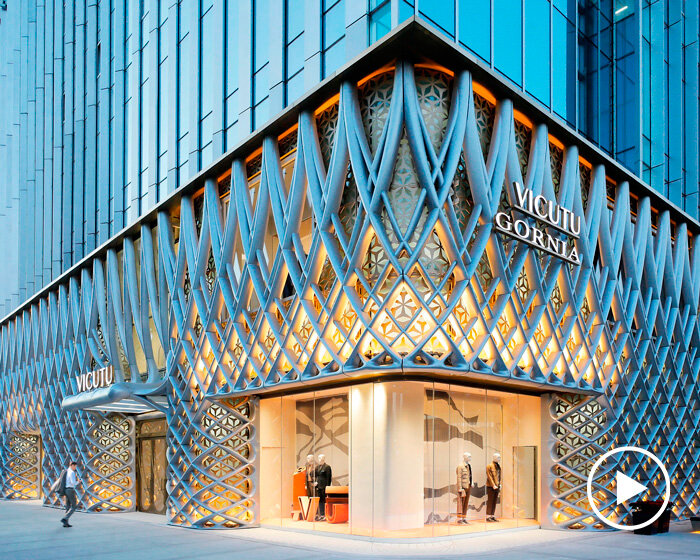 antistatics bents aluminum sheets into weaved facade for concept flagship store in beijing